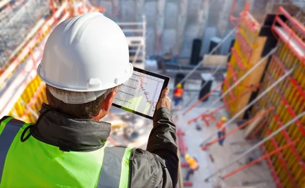 Stock Construction Site with Tablet