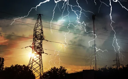 Picturesque lightning storm over high voltage towers