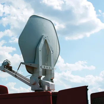Television vehicle with parabolic antenna on the roof