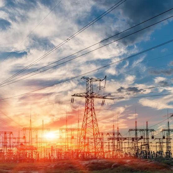 distribution electric substation with power lines and transformers.